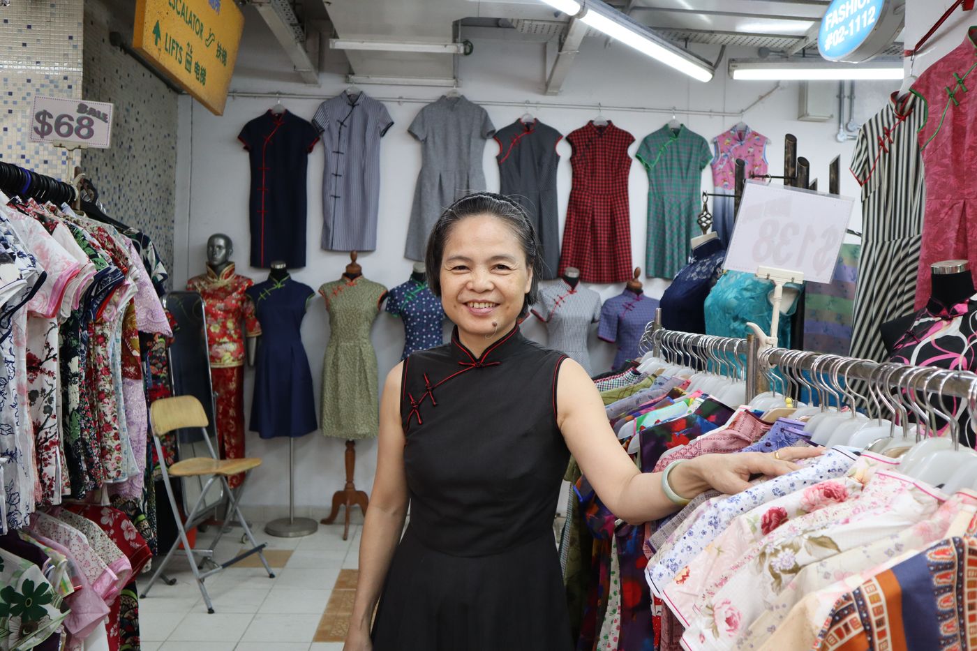 Madam Li Qiying has been in the cheongsam-making business for over four decades. She makes each cheongsam one by one, still cutting the pattern by hand from the fabric and using handmade buttons.